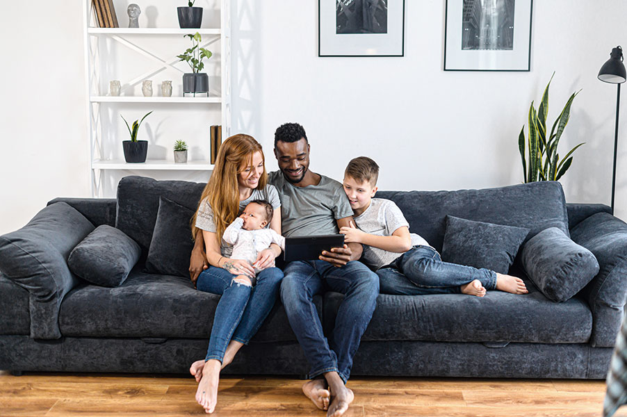 Enjoy a cozy living room with a new furnace installed by Arctic Heating, Cooling & Electrical.